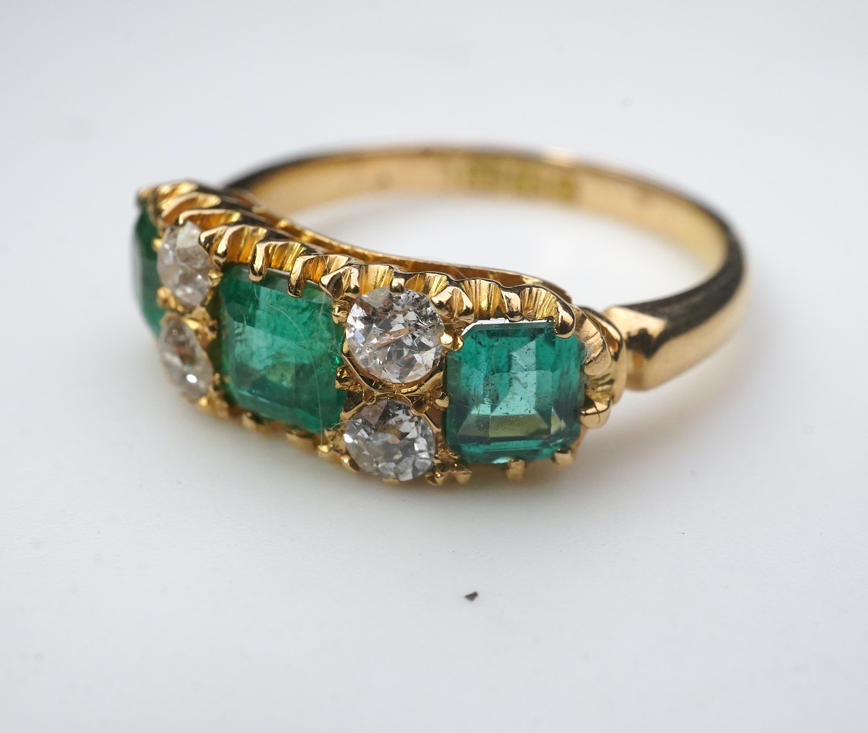 A late Victorian emerald and diamond ring, circa 1901